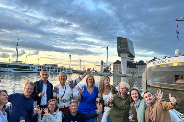 a group of people standing in front of a crowd